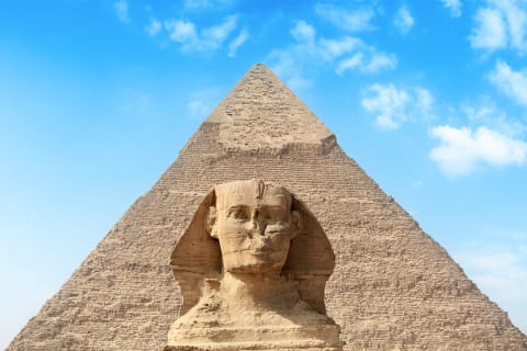 The Great Sphinx and ancient Egyptian pyramid in Giza, Egypt