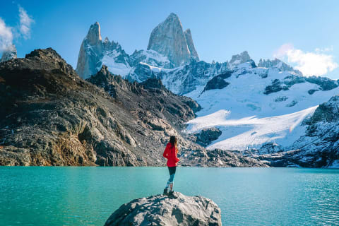 Woman at lake on Mount Fitzroy in Patagonia