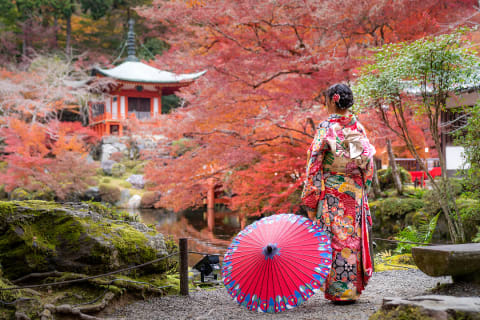Japanese lady in front of Digoji Temple in Kyoto, Japan