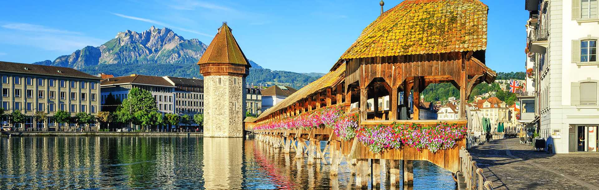 Deck covered in flowers on a lake in Lucerne, Switzerland.